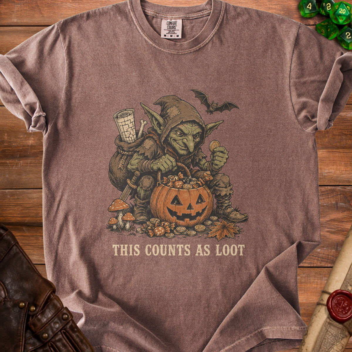 Goblin with a pumpkin basket filled with candy and coins, text says "This Counts As Loot".