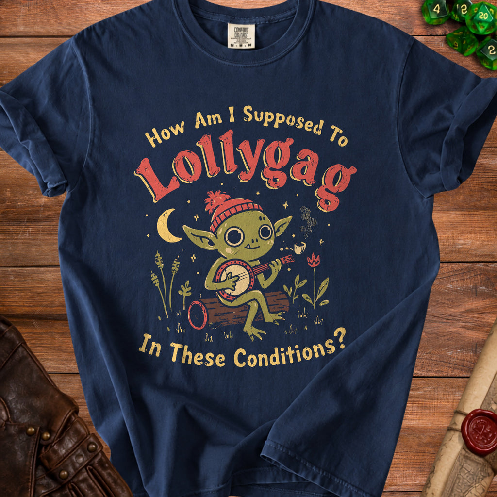 Navy t-shirt with a green goblin playing a banjo and text "How Am I Supposed To Lollygag In These Conditions?"