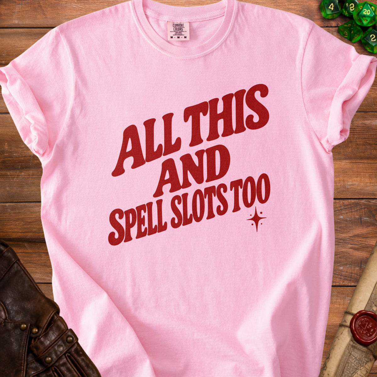 Pink t-shirt with red text "All This And Spell Slots Too".
