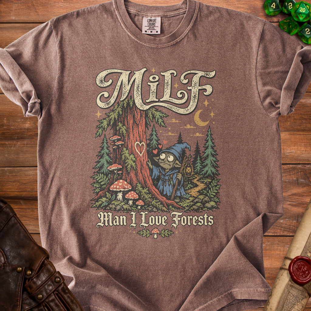 Brown t-shirt with "Milf Man I Love Forests" text and woodland goblin graphic.
