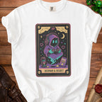 White t-shirt with "Respawn & Regret" gamer graphic featuring a hooded figure, "Level Up Juice", and "Rage Chips".