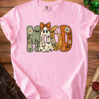 Pink t-shirt with groovy "M O O D" text featuring ghost, moon, and floral designs.
