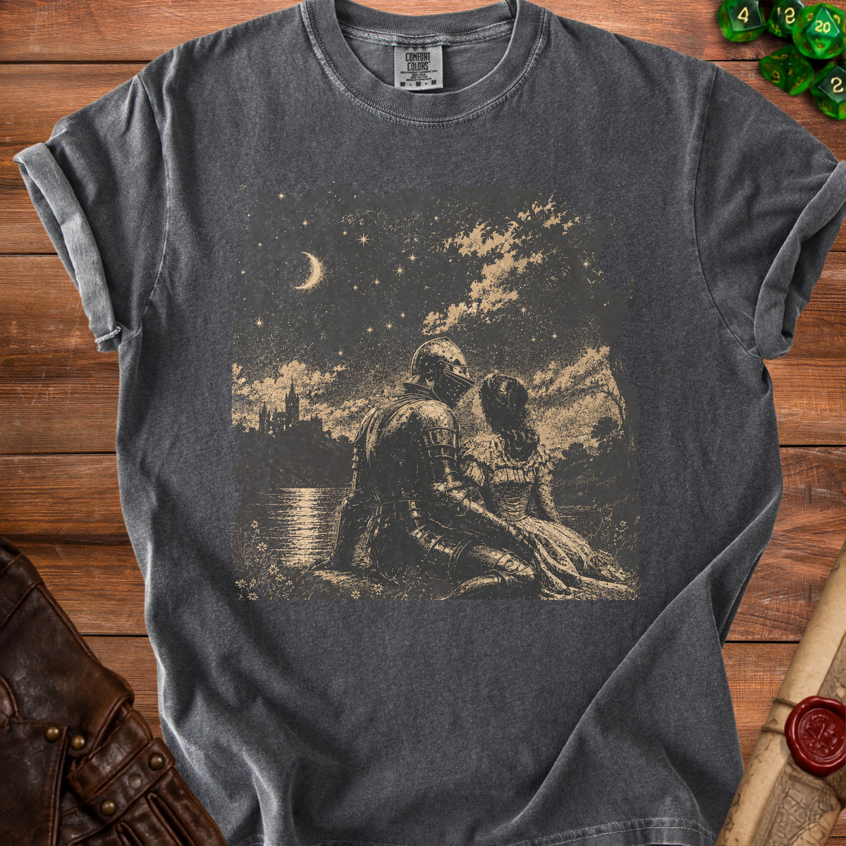 T-shirt with a knight and lady sitting under a starry sky.