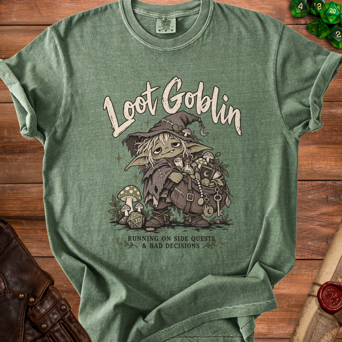 Green t-shirt with "Loot Goblin" art, a goblin with mushrooms, dice, and a bag of loot.