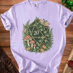 Purple t-shirt with a d20 dice design featuring mushrooms, ferns, and moths.