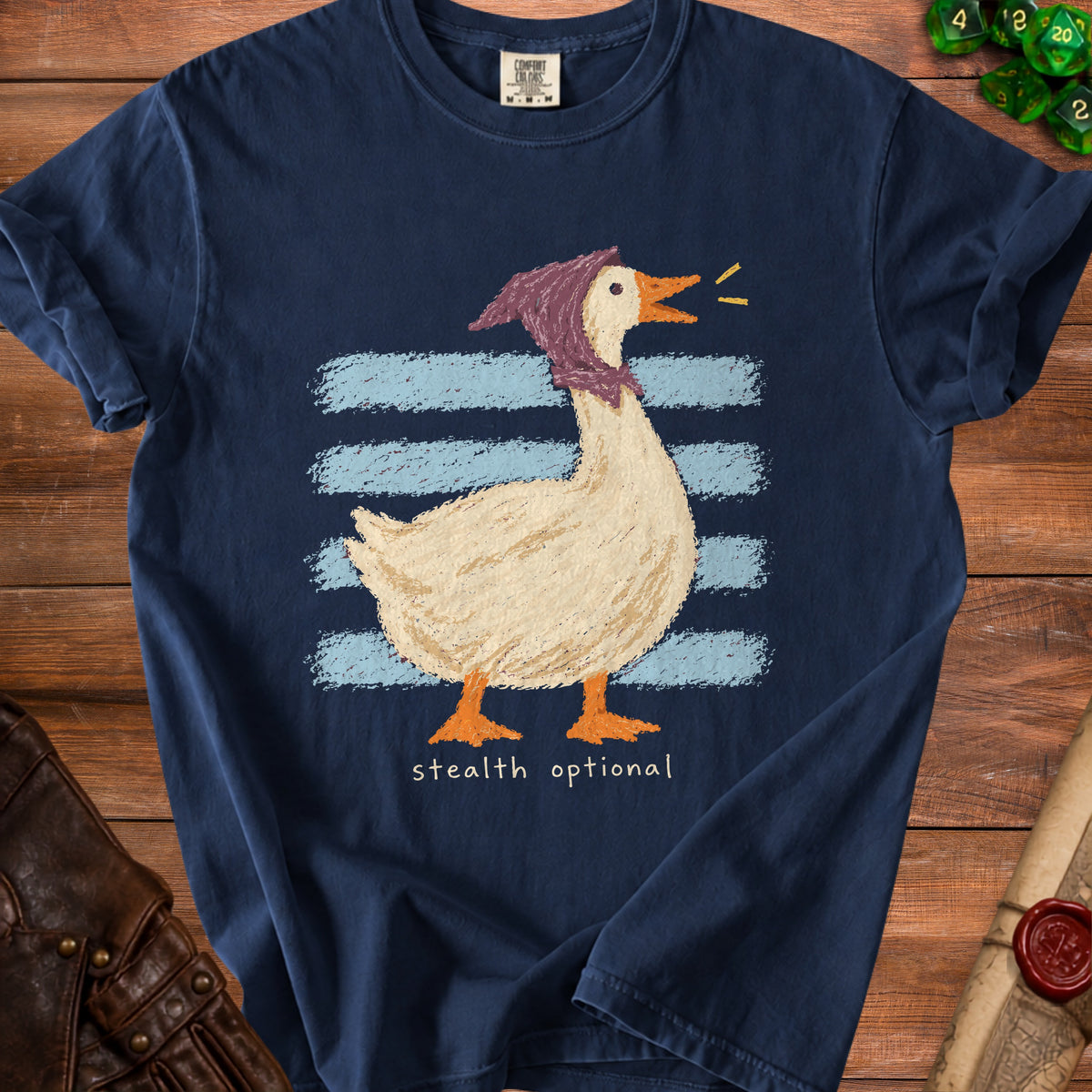 Navy t-shirt with a goose wearing a scarf and the text "stealth optional."