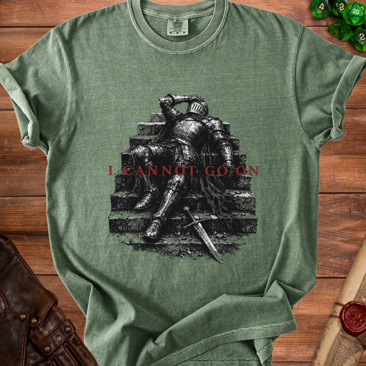 T-shirt with knight resting on stairs and "I CANNOT GO ON" text.