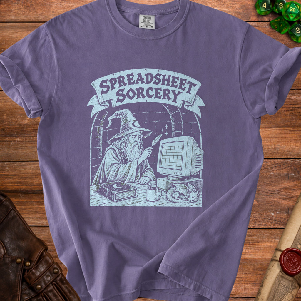 Purple t-shirt with "Spreadsheet Sorcery" text and wizard at computer graphic.
