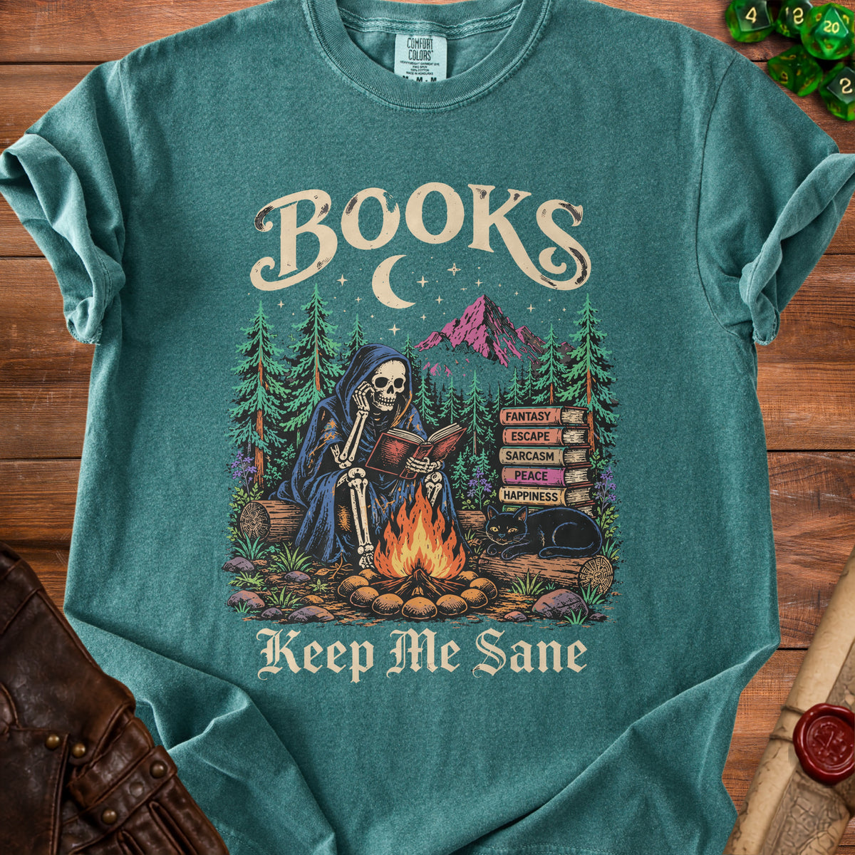 Skeleton reading by campfire with books, cat, and mountains, reads "Keep Me Sane".