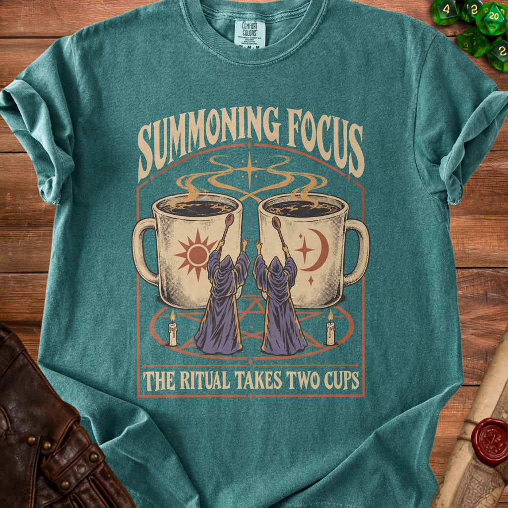 T-shirt with "Summoning Focus, The Ritual Takes Two Cups" and wizard graphic.