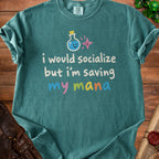 Teal Comfort Colors t-shirt with "I would socialize but I'm saving my mana" text and potion graphic.
