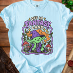 Light blue t-shirt with "Off in Fantasy Land" graphic of a gnome with a pipe.