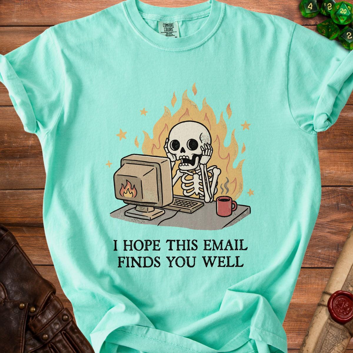 Skeleton at computer with flames and text "I HOPE THIS EMAIL FINDS YOU WELL".