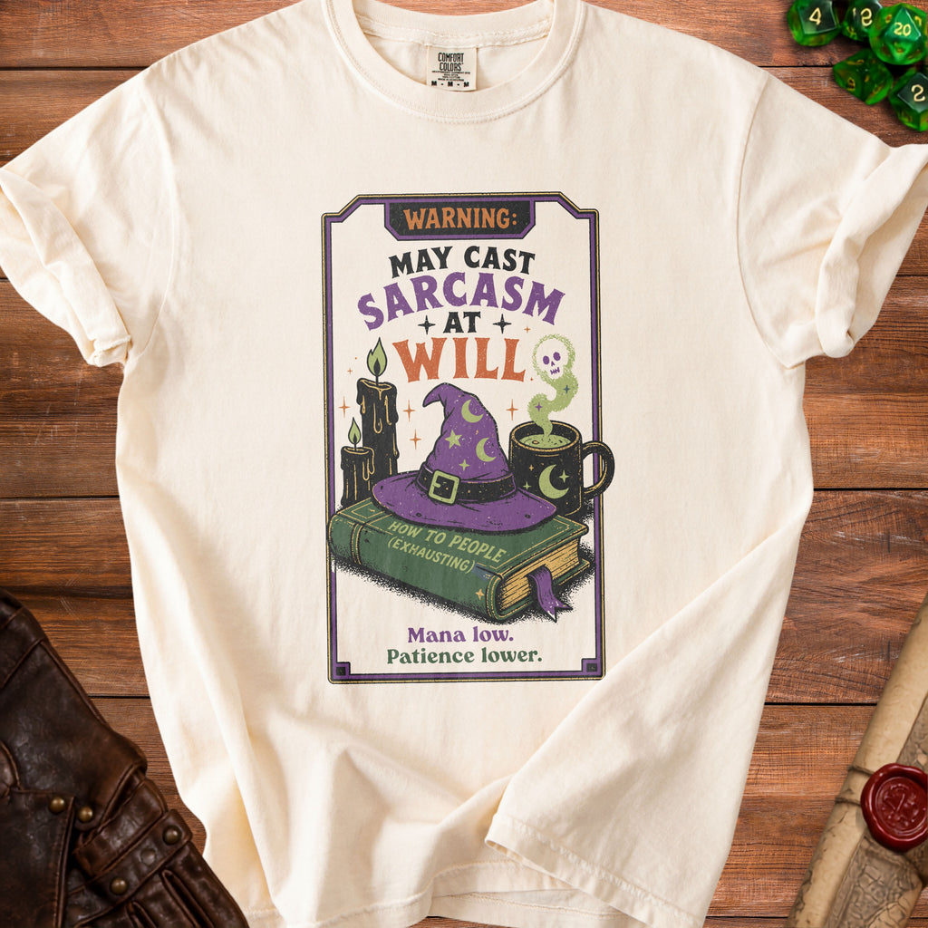 Cream t-shirt with "Warning: May Cast Sarcasm At Will" design.