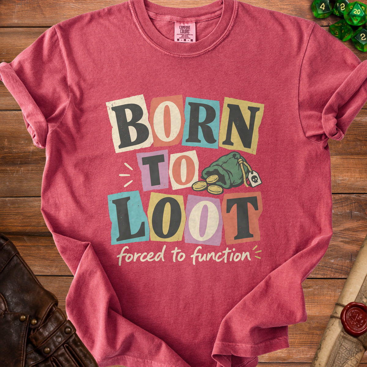 Red t-shirt with "BORN TO LOOT forced to function" text and a money bag graphic.