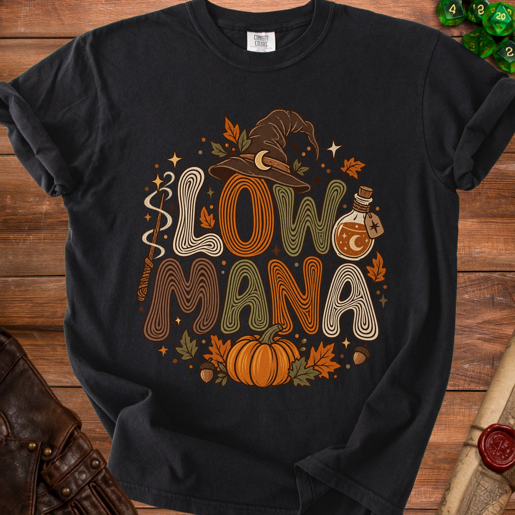 Black t-shirt with "Slow Mana" text, witch hat, pumpkin, and potion bottle.