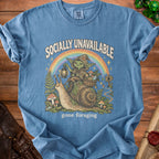 Blue t-shirt with illustration of a goblin on a snail, "Socially Unavailable gone foraging".