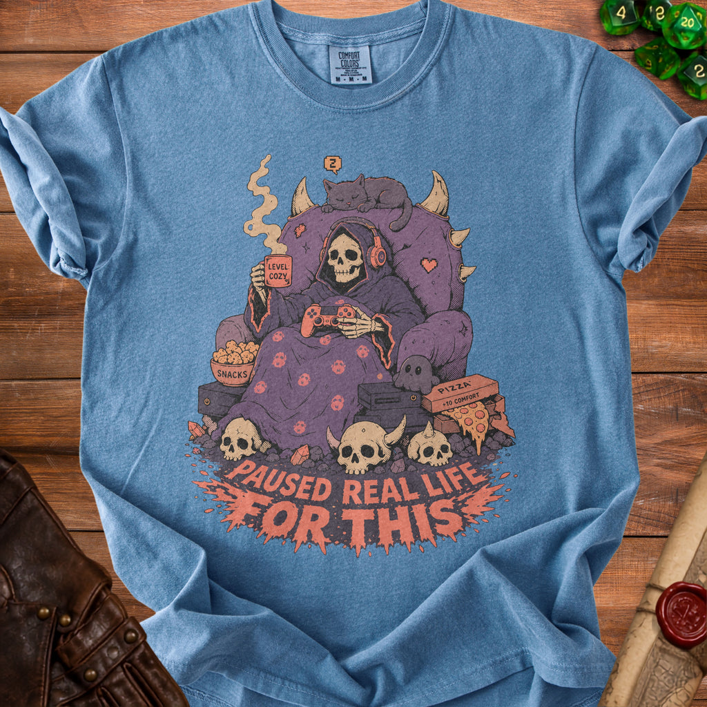 Grim Reaper playing video games, holding coffee, text "PAUSED REAL LIFE FOR THIS".