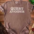 Brown t-shirt with "QUEST AVOIDER" printed in white text.