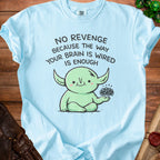 Light blue t-shirt with a cartoon character and text "NO REVENGE BECAUSE THE WAY YOUR BRAIN IS WIRED IS ENOUGH".