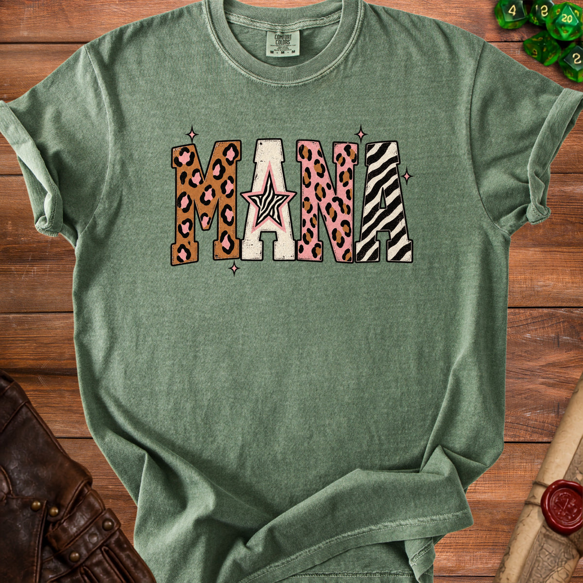 Green t-shirt with "MANA" text in cheetah and zebra print patterns.
