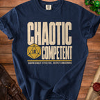 Navy t-shirt with "CHAOTIC COMPETENT" and d20 dice graphic.