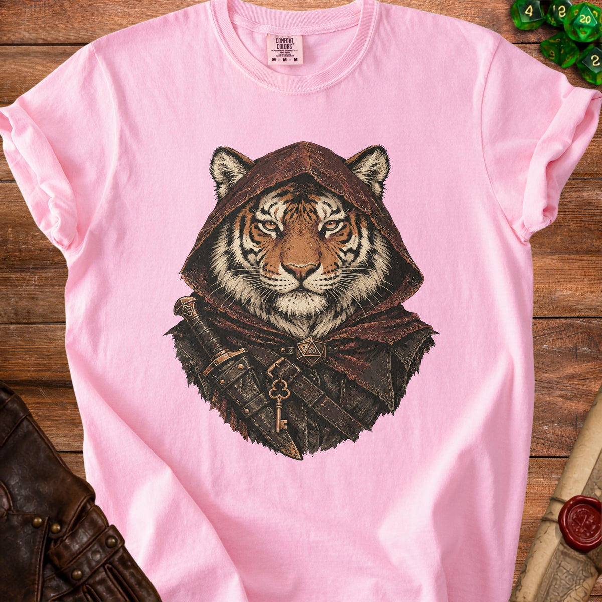A pink crewneck t-shirt featuring an illustration of a tiger wearing a hooded cloak and armor.