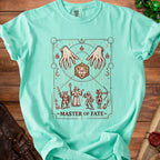 T-shirt with "Master of Fate" text and fantasy character art.