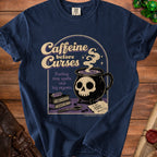 Dark blue t-shirt with "Caffeine before Curses" graphic featuring a skull coffee mug.