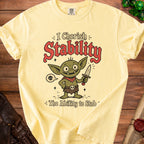 Yellow t-shirt with cartoon goblin and text "I Cherish Stability The Ability to Stab".