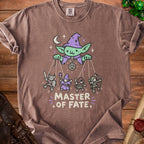 Brown t-shirt with "Master of Fate" and goblin puppet master with adventurers.