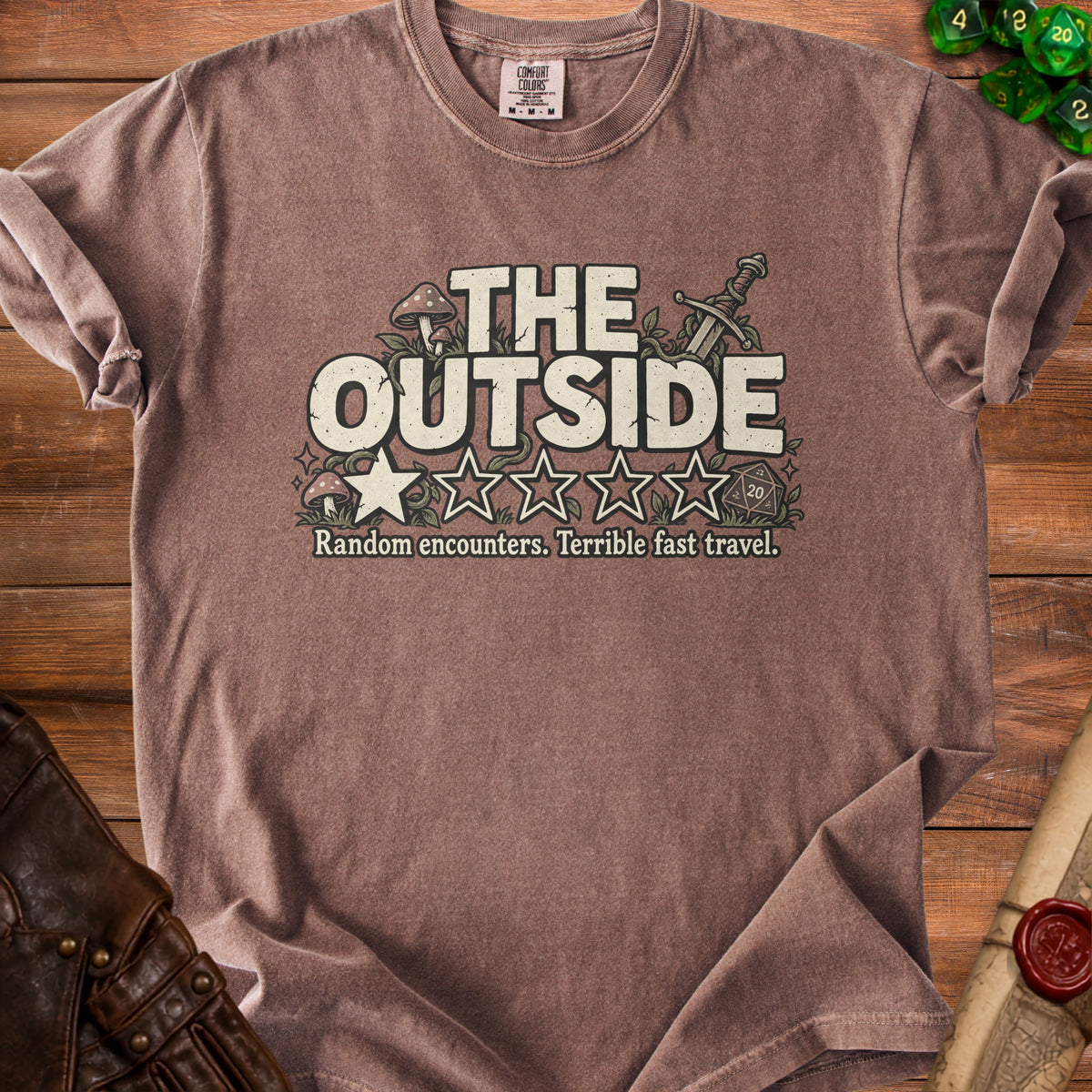 Brown t-shirt with "The Outside" text, stars, mushrooms, and sword graphic.