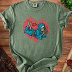 Green t-shirt with a grim reaper holding a treasure chest, text "LOVE AT FIRST LOOT".