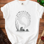 White t-shirt with illustration of a goblin, pumpkin, and bats with keys.