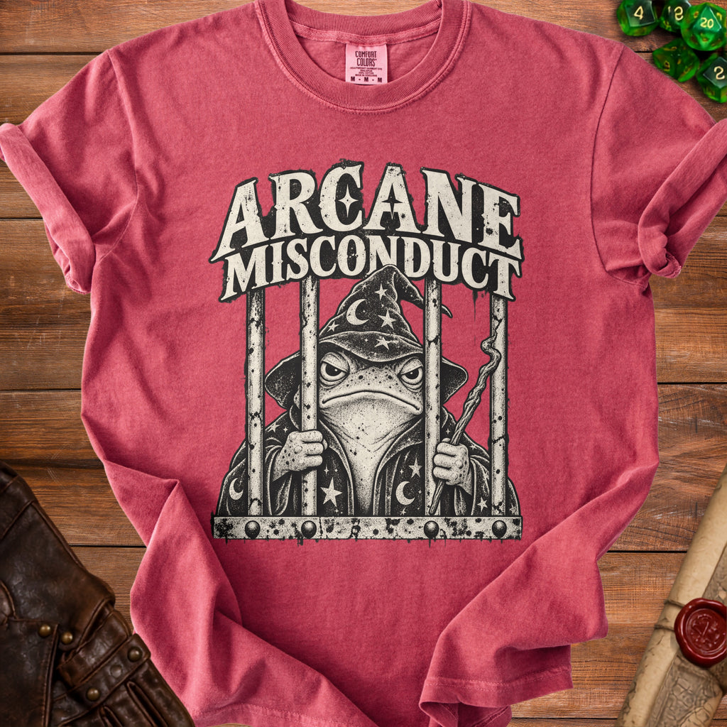 T-shirt with a frog wizard design and the text "ARCANE MISCONDUCT".