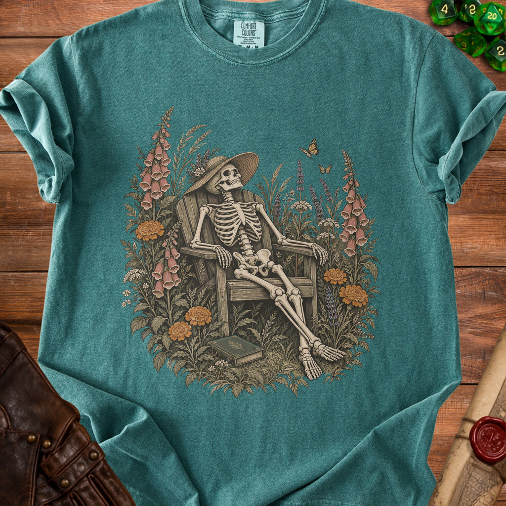 Skeleton in a straw hat relaxing in a chair surrounded by flowers and butterflies.