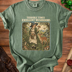 T-shirt with "Terrible Times Excellent Mushrooms" text, witch, deer, and mushrooms.
