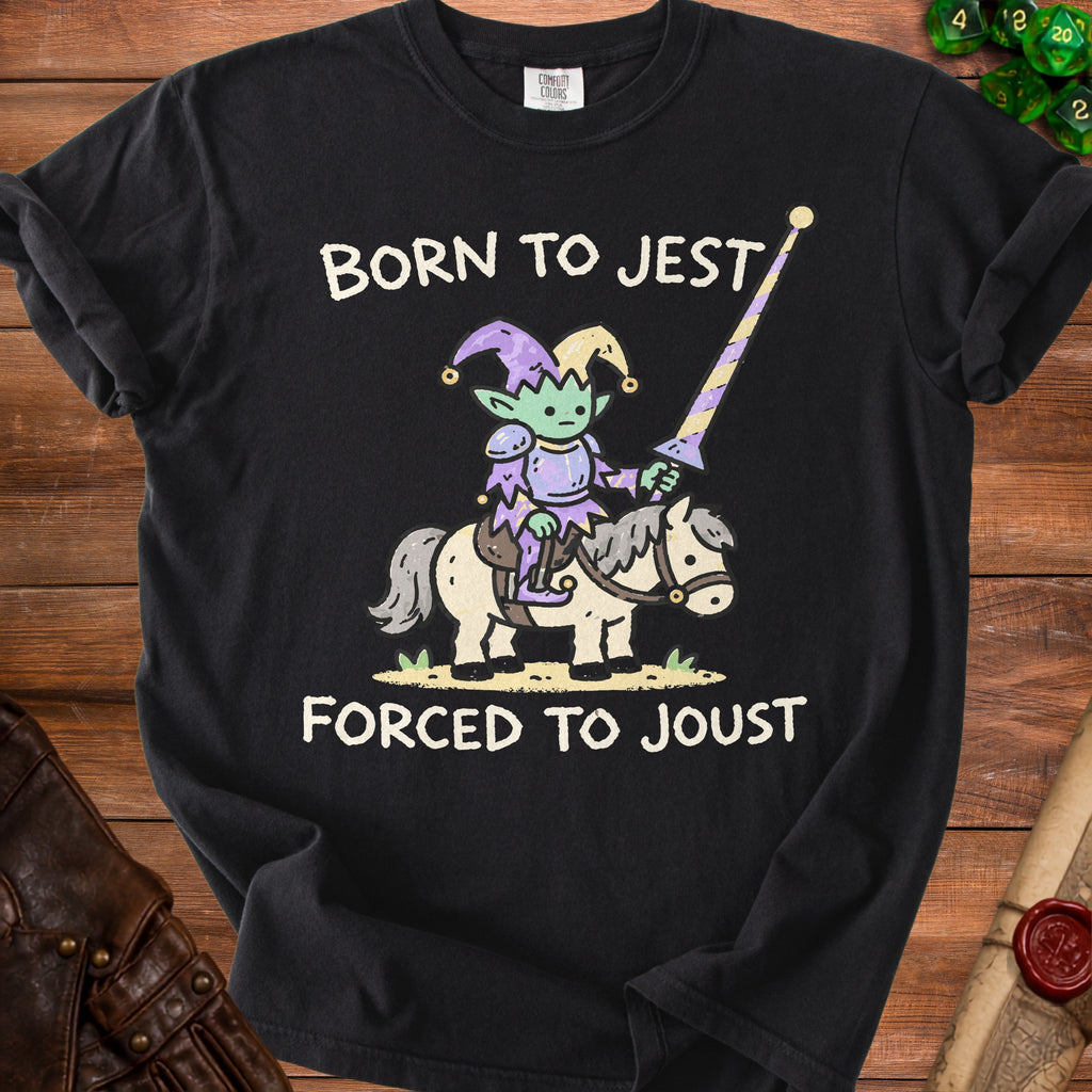 Black t-shirt with cartoon goblin jester riding a horse, text "Born to Jest Forced to Joust".