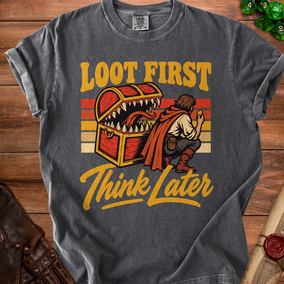 Dark gray t-shirt with "Loot First Think Later" text and a monster chest.
