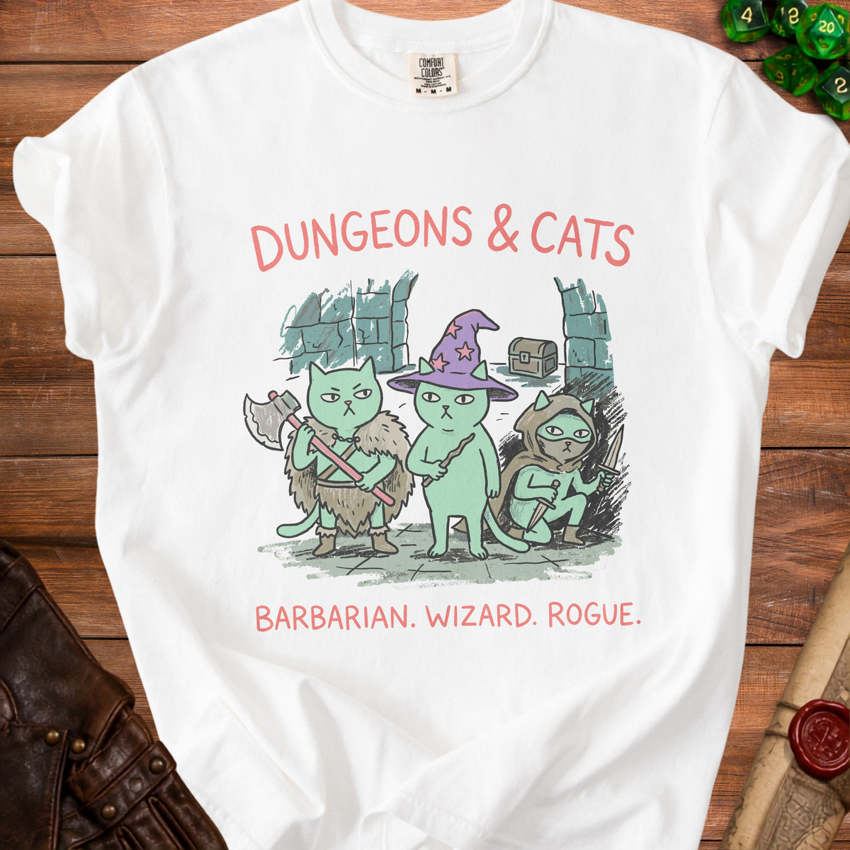 White t-shirt graphic: Dungeons & Cats with barbarian, wizard, and rogue cats.