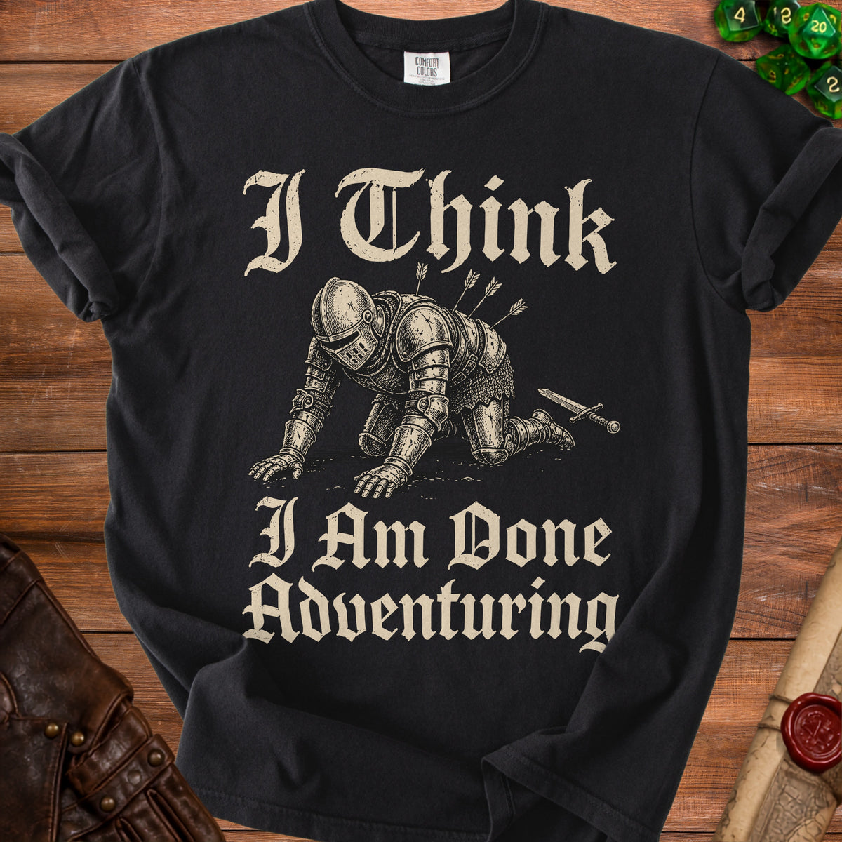 Black t-shirt with knight illustration and "I Think I Am Done Adventuring" text.
