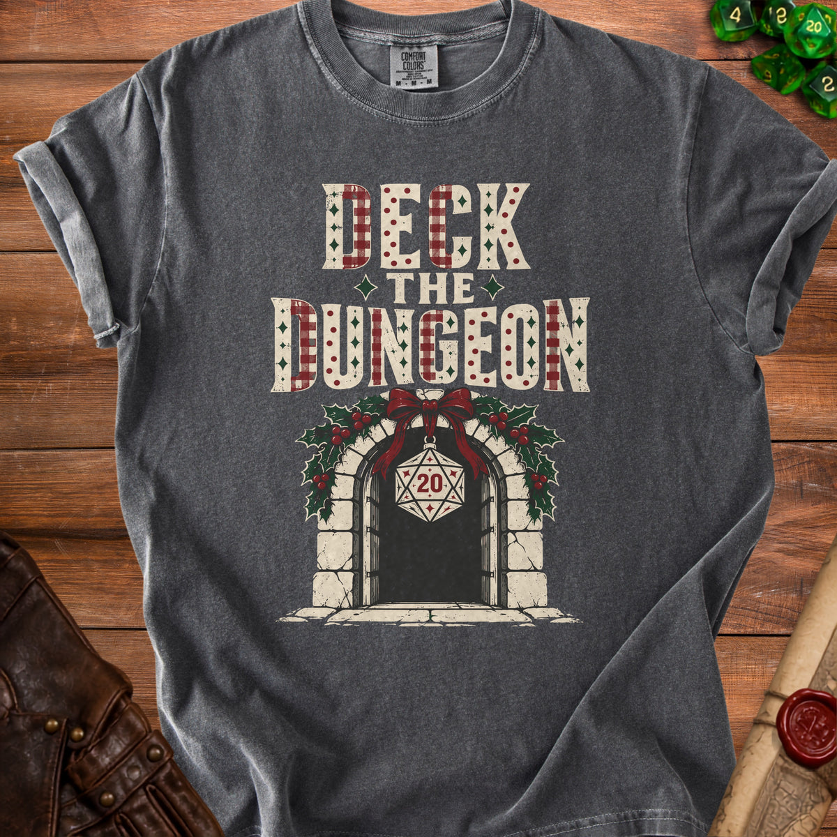 Dark gray t-shirt with "Deck the Dungeon" text over an arched doorway.