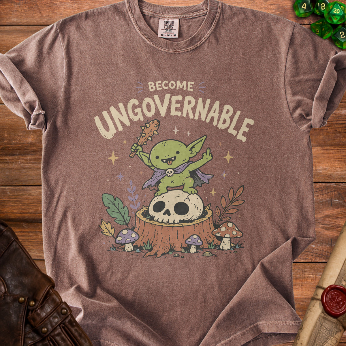 Goblin on a skull on a tree stump, text "BECOME UNGOVERNABLE."