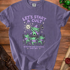 Purple t-shirt with goblins and text "LET'S START A CULT RECRUITING BAD INFLUENCES SINCE 1692".