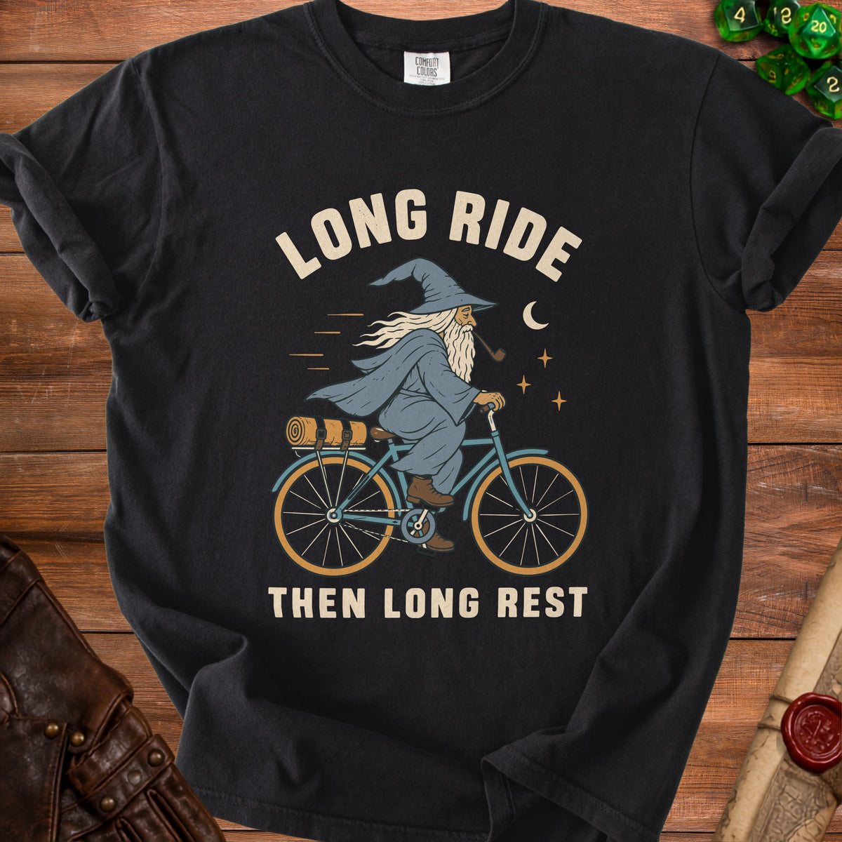 Black t-shirt with wizard riding a bicycle and text "Long Ride Then Long Rest".