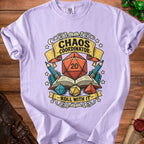 Purple t-shirt with "Chaos Coordinator" and "Roll With It" text and D20 dice graphic.