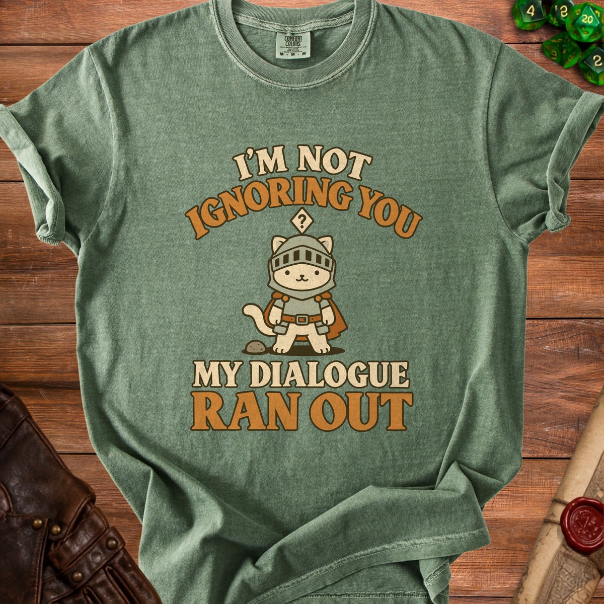 T-shirt with a knight cat graphic and text "I'm not ignoring you, my dialogue ran out."