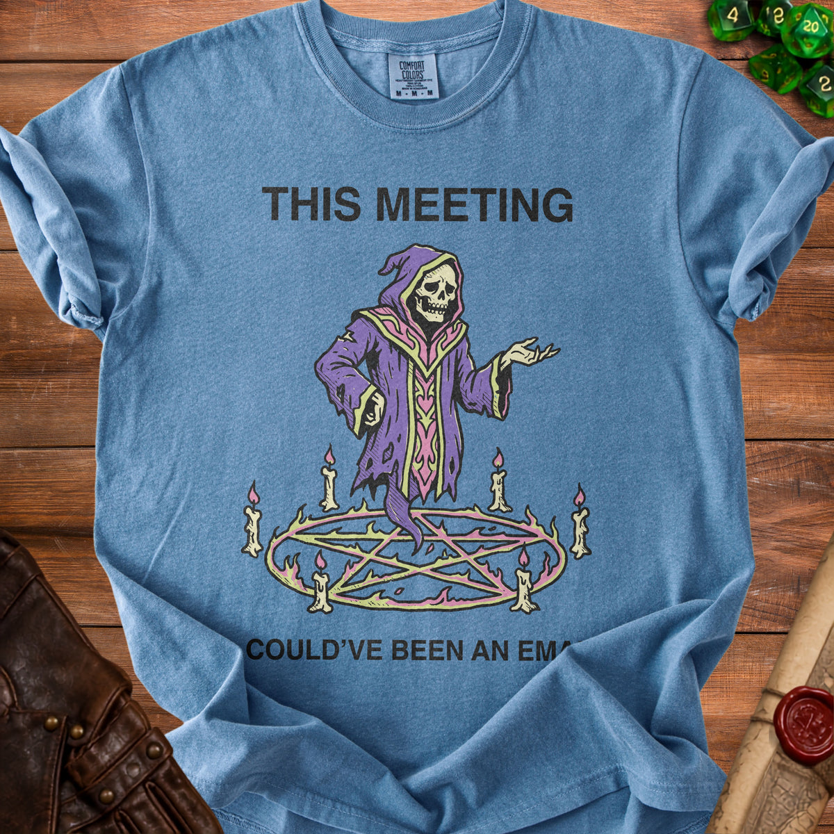 Blue t-shirt with Grim Reaper graphic and text "This meeting could've been an email."