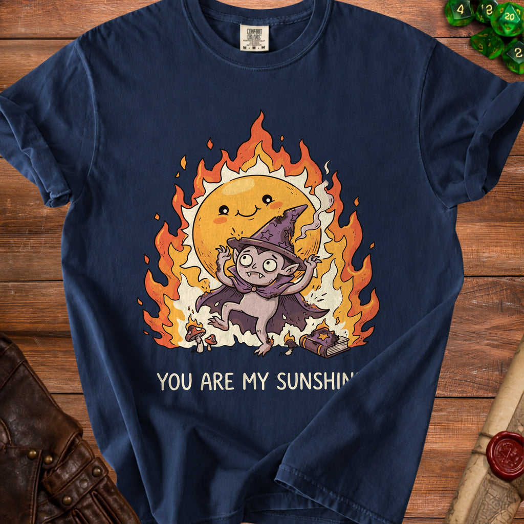 Dark blue t-shirt with cartoon vampire, smiling sun, flames, and text "You Are My Sunshine."