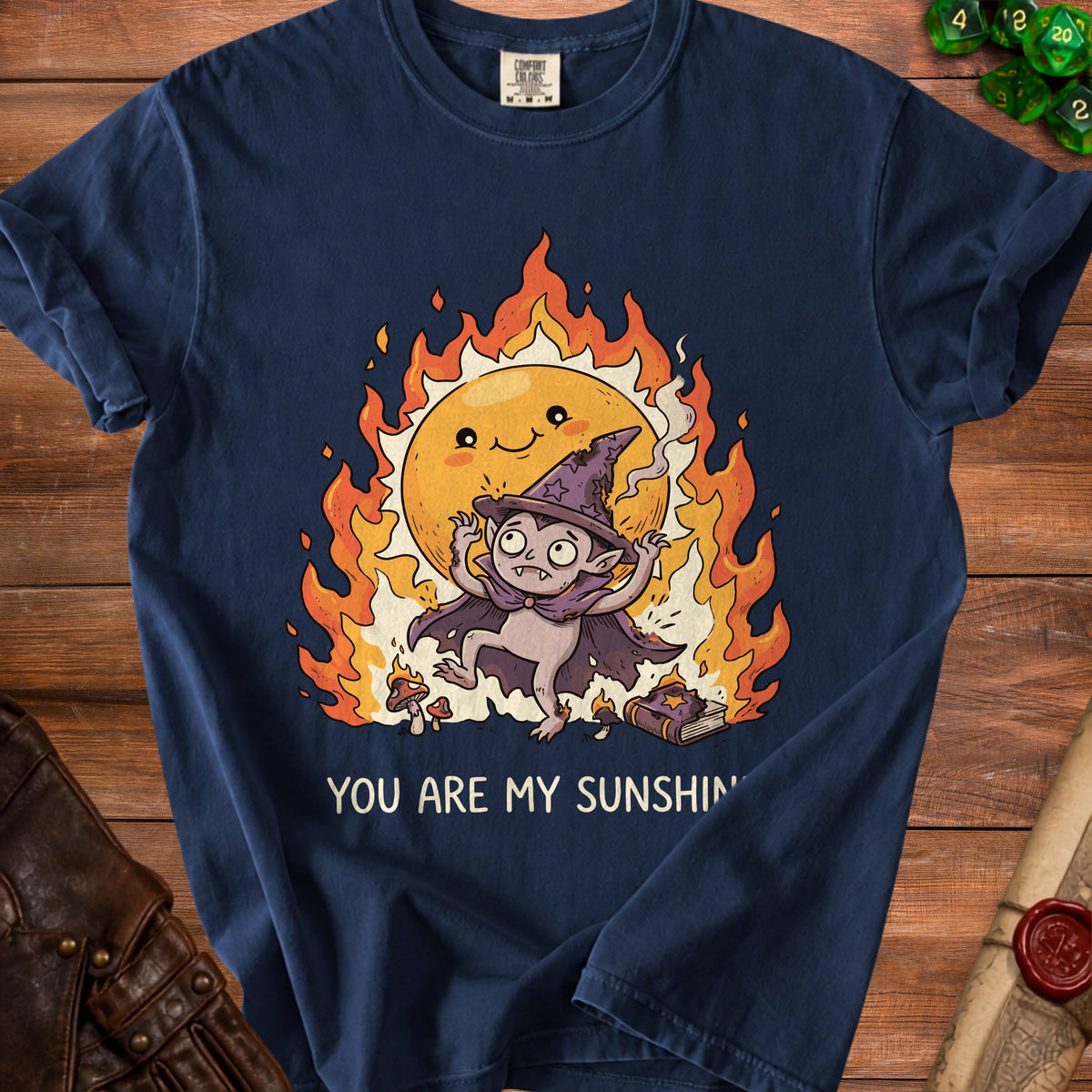 Dark blue t-shirt with cartoon vampire, smiling sun, flames, and text "You Are My Sunshine."
